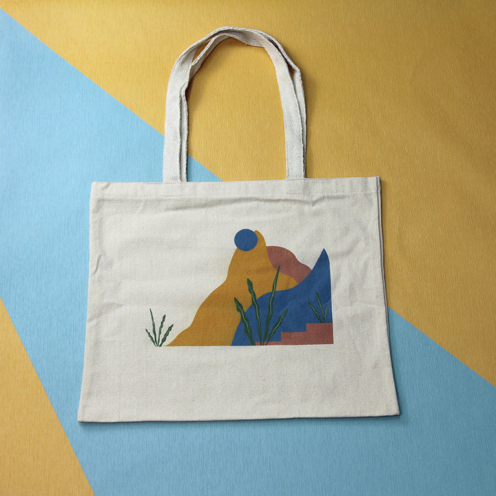 Tote bags in Egypt. Linen is the material used in the shopping bag. There is two different shapes Portrait tote bag & Landscape tote bag. It's Eco-friendly & fashion bag. 